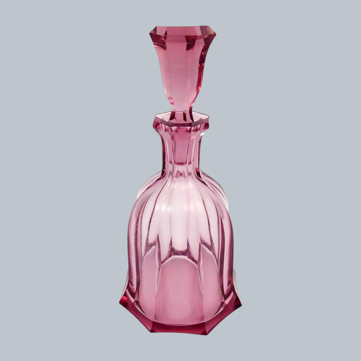 Elegant Rose-Tinted Cut Glass Decanter with Octagonal Stopper